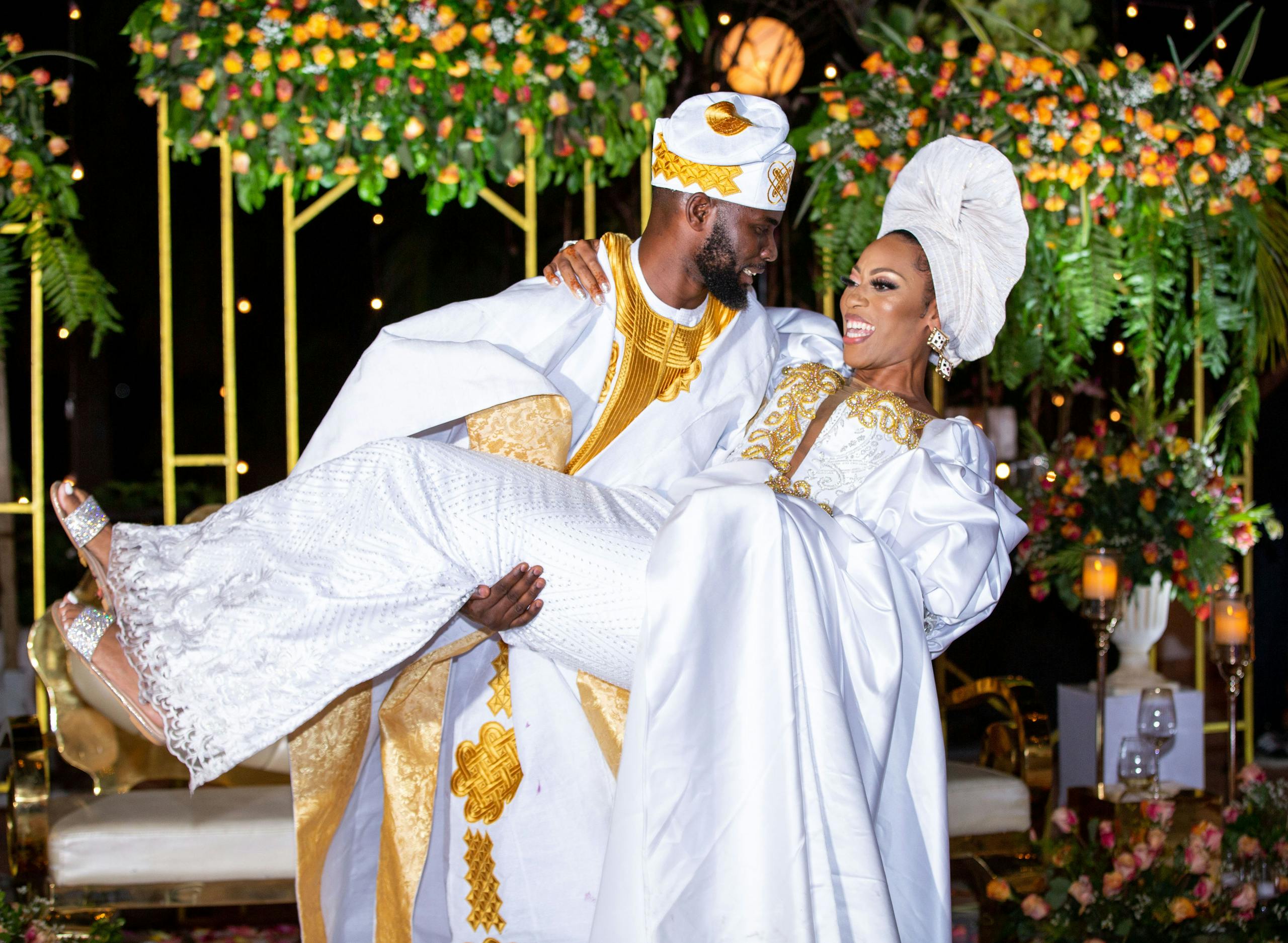 joyful-couple-in-traditional-african-attire-celebrates-their-wedding-with-a-lively-outdoor-ceremony.-11087143-scaled